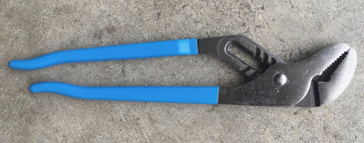Channellock 12-inch tongue-and-groove pliers with blue handles on concrete